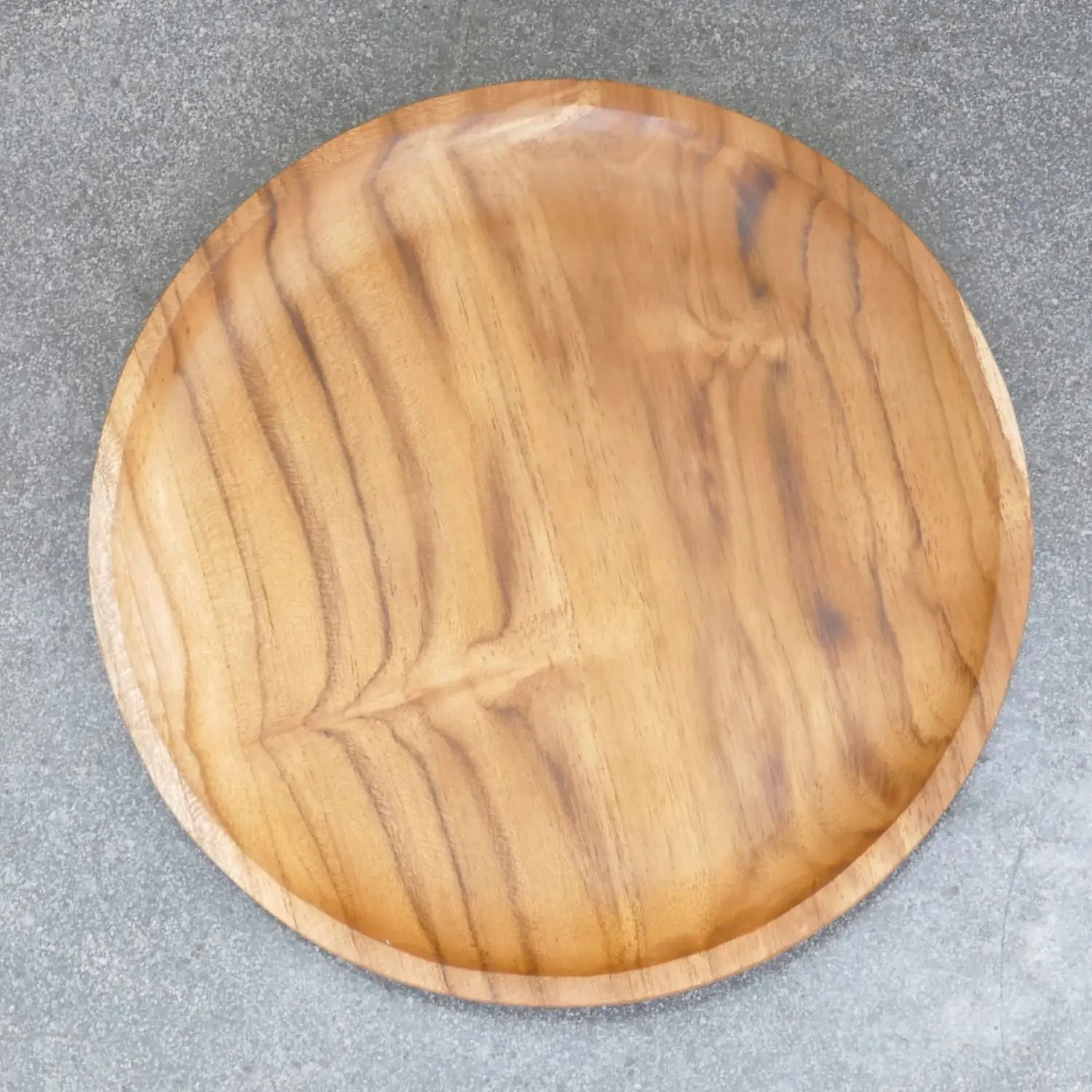  Product image 2 of the product “Wooden plate, made of teak wood, 25 cm dia. ”